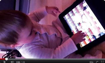 Photo of child using tablet