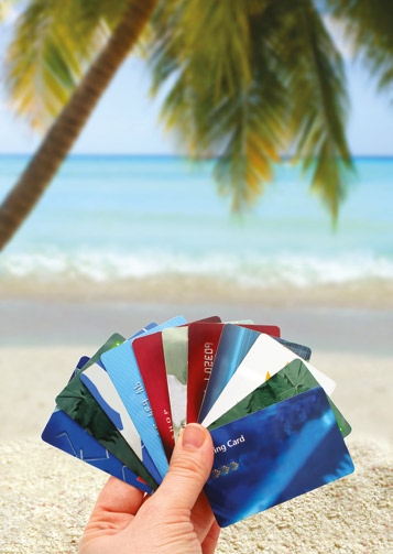 Photo of credit cards with beach scene as background