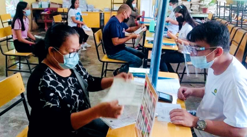 LANDBANK Sagay Branch facilitates the account opening of unbanked Philippine Identification System (PhilSys) registrants at a registration center in Sagay City, Negros Occidental on June 2, 2021.